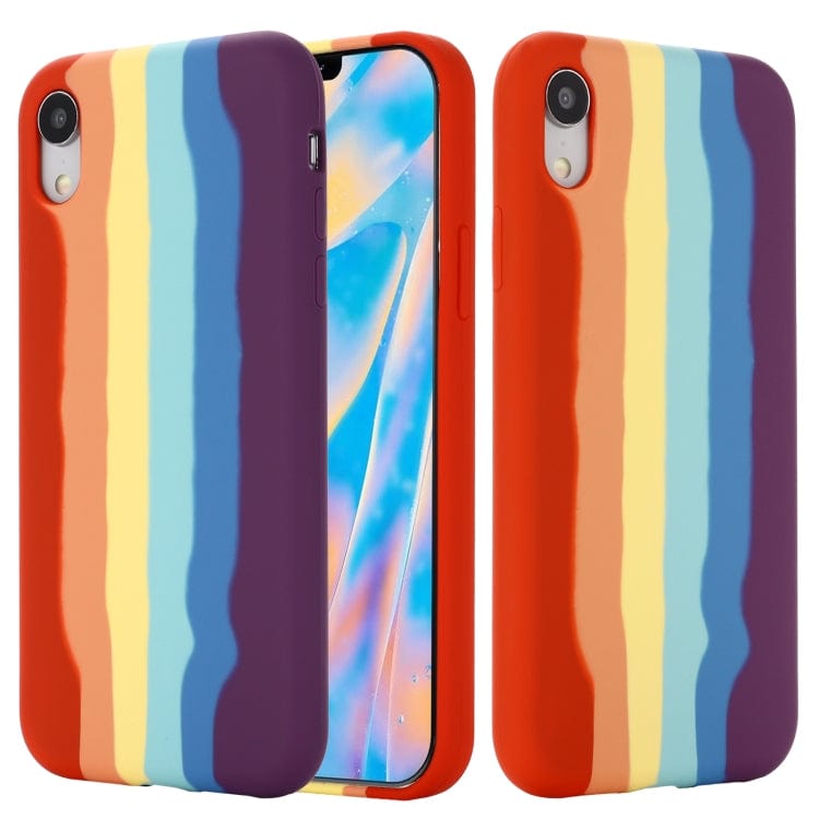 a close up of three different colored suitcases