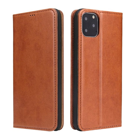 a brown suitcase with a cell phone on it 