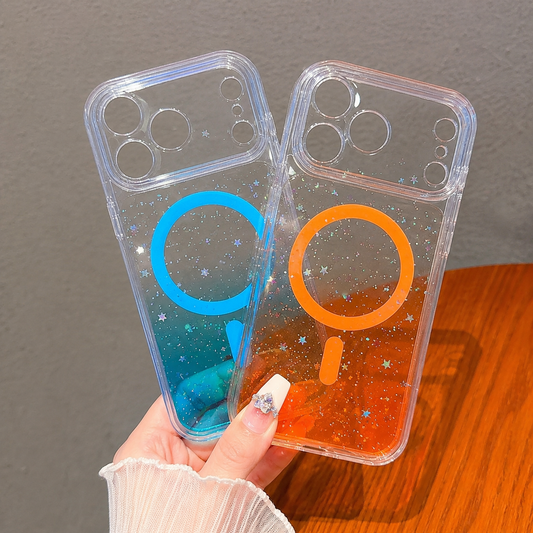 Coques iPhone 17 Pro Max magnétiques dégradées époxy Bleu et Orange – duo en main