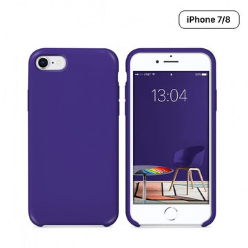 a couple of cell phones sitting on a table 